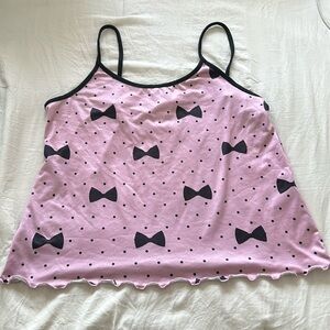 Purple/pinkish pj top with polkadots and bows